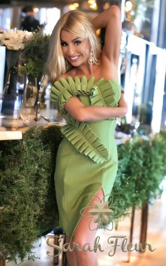 Green serpentine dress