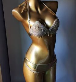 Golden Eye bikini model